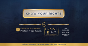 A legal services advertisement on a dark blue background with gold accents. A gold-bordered banner at the top reads "KNOW YOUR RIGHTS". Below, a gold scales of justice icon accompanies the text "Understand Your Options. Protect Your Claim.". To the right, under a gold shield with a checkmark, are the firm details: "CRM&K", a headset icon for "24/7", and "CUSIMANO, ROBERTS, MILLS & KNOWLTON, LLC". Contact information includes "(256) 543-0400" and "153 S. 9th St. Gadsden, AL 35901". A gold banner at the bottom states "Helping Alabama Families Make Informed Decisions".